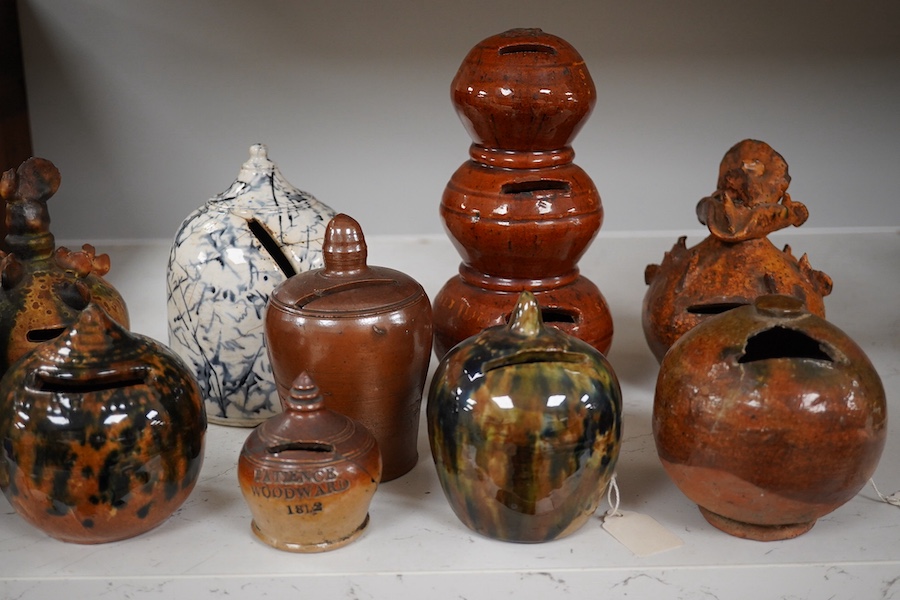 A group of ten various 19th century stoneware money boxes, tallest 19cm. Condition - varies